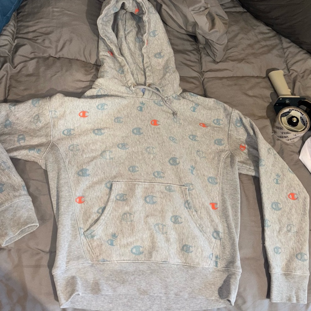 Champion Light Gray Hoodie with Blue and Red Accents